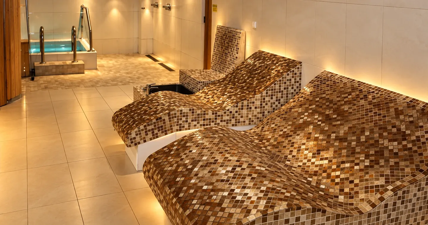 Heated stone loungers to rest on after a massage in Erdington